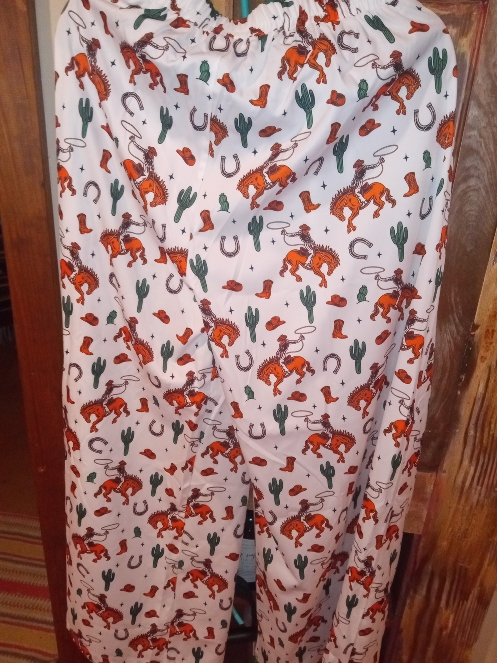 Southern Stitch Wide Leg Pants in White with Orange Cowboy Print